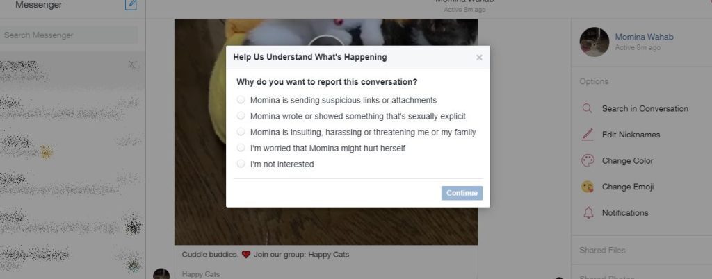 how to report spam messages on facebook messenger