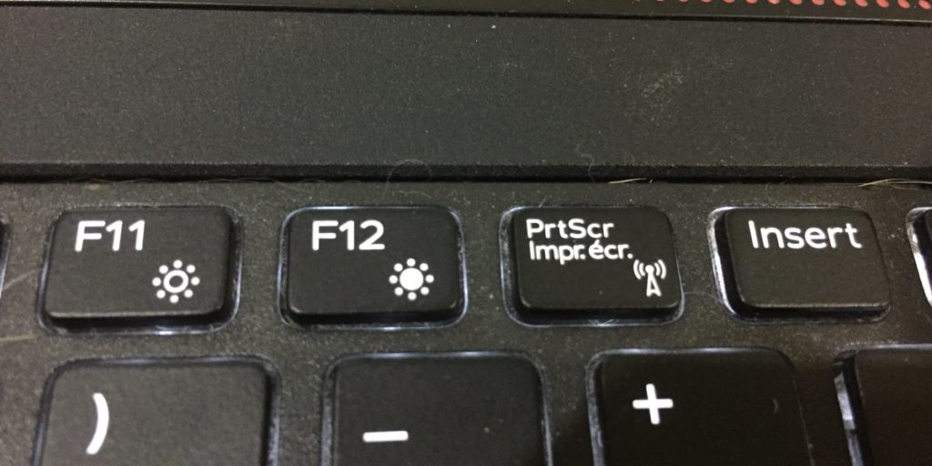 How to identify symbols on function keys on a Windows 10 laptop